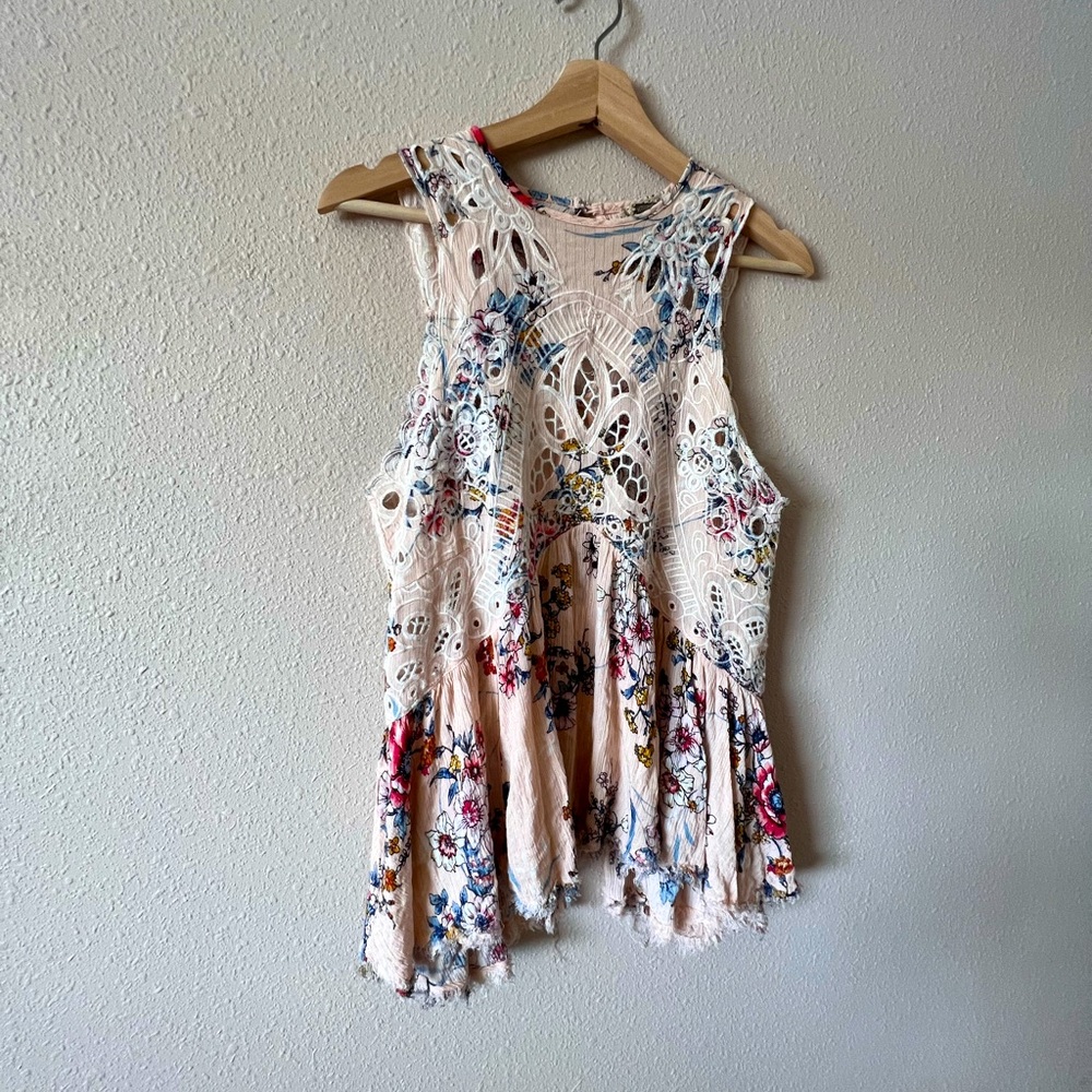 Detailed floral tank. From buckle